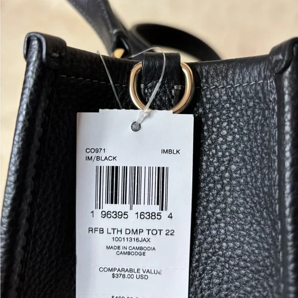 Coach Dempsey leather bag